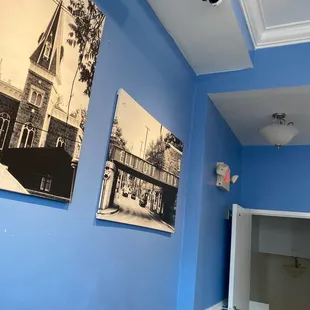 a dining room with blue walls