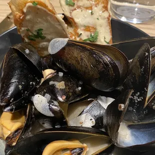 PEI mussels. Wish the broth had more flavor and herb. Bread had the much needed fat.
