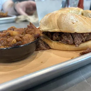 Brisket sandwich and settlers beans