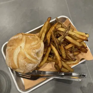 Pork sandwich and fries