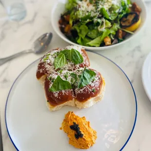 Parker House Rolls with cavier butter and Ellie's Caesar with grilled lemon