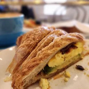 Breakfast sandwich with bacon on croissant