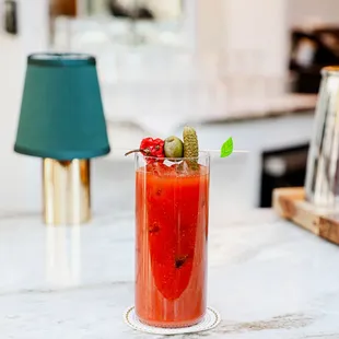 a glass of bloody cocktail