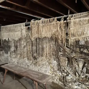 Harness shop.  These keep the flies off the horses