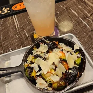 Elliot's Wood-Fired Kitchen &amp; Tap Brussel Sprouts roasted in a honey Sriracha    Steak, Southwest slaw, avocado &amp; cilantro