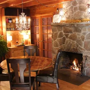 Enjoy the Fire Side Room for evening Happy Hour and gourmet breakfast by Greg and Joanne Elliott