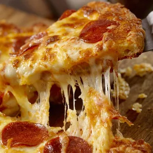 a slice of pepperoni pizza