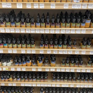 a shelf full of essential oils
