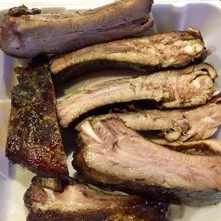 OMG the ribs were so damn good I had to order more!  Half chicken was also awesome - but brisket was dry