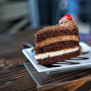 Very chocolatey Black Forest Gateau Cake - $3.75 (don&apos;t ask about the white cream, my son ate it before I had a chance to try that part!!)