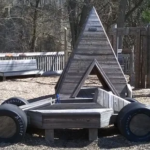 wooden race car and a teepee