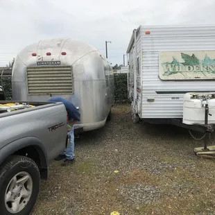 RV storage, gravel paved, wide enough, several spots to choose from. Some muddy spots. Security cameras and checked by  staff visits too.