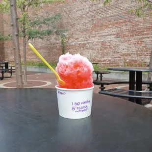 a cup of ice cream on a table