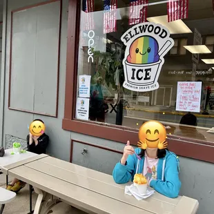 Enjoying our shave ice outside the lil&apos; shop. Love their cute logo!