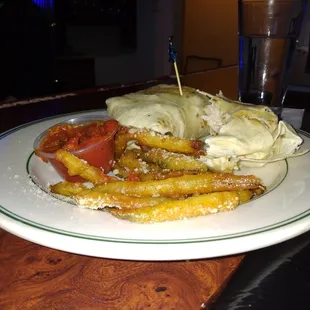 Chunky, tender grilled chicken Caesar wrap with crunchy zucchini fries!