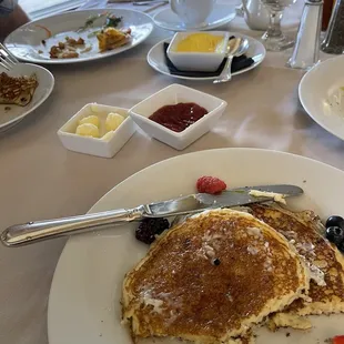The pancakes at brunch are so fluffy and great. Served with warm syrup!