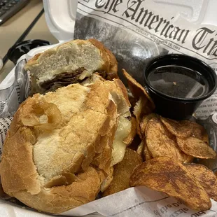 Soft pillowy roll stuffed with tender roast beef, side of tangy us jus and homemade chips