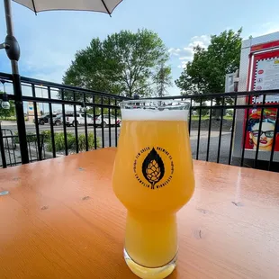 a glass of beer on a table