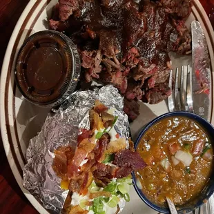 Chopped brisket, beans and baked potato.