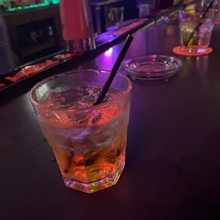 a drink in a glass with a straw