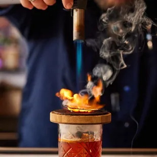 C&amp;K Smoky Old Fashioned:
Knob Creek Smoked Maple Bourbon, Smoked Maple Syrup, Smoked Bitters, Orange, Luxardo Cherry, Maple Smoke