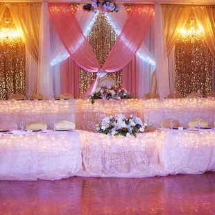 Pictures cant describe how beautiful the head tables and background looked.