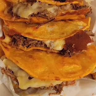 $22 for 4 quesabirria tacos. Fully loaded w cheese n meat. This can easily feed 2 ppl
