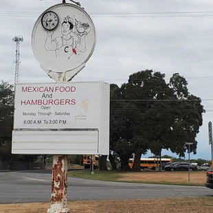 Outside sign, not sure if they actually sell hamburgers though