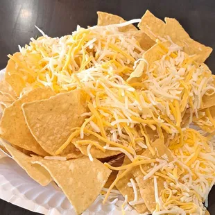 Chips with shredded cheese--it&apos;s not melted, so it makes a mess falling off the chips when you grab them.