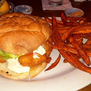 Fish sandwich w/ tartar sauce. Sweet potato fries w/ honey aioli. Amazing!
