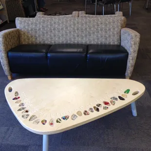 Cute alphabet table with examples for each letter of the alphabet. Also, comfy seating.