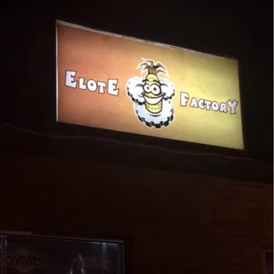 the sign for elote factory