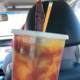 This is the mangonada and it's amazing!! highly recommend and it was only $6!