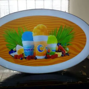 a plate with drinks and fruit
