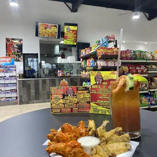 Chicken Wings and michelada.