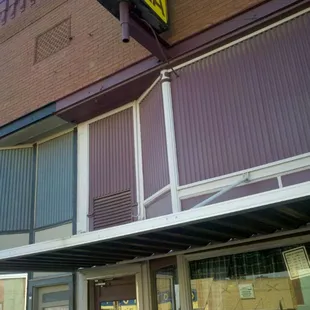 Look for the yellow pizza sign :)