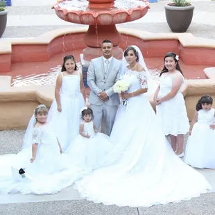 Alterations for Ivette:  Hem, bustle, hand-beading.