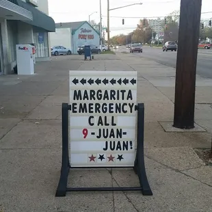 a sign for emergency call juan