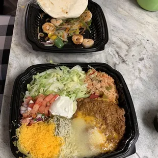 The "extras" plate has lot, but the beans have a tough crust on top.