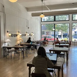 Coworking desk space for laptop work or socialization