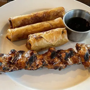 Beef, chicken,pork egg rolls and bbq skewer.