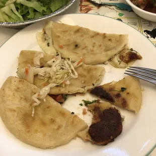 &apos;Chicharrón and cheese, loroco and cheese, zucchini and  cheese pupusas . Hardly any filling mostly cheese.