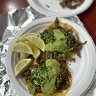 carne asada and pastor taco