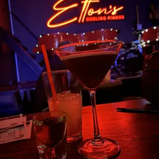 two cocktails on a bar
