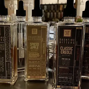 three bottles of classic cologne