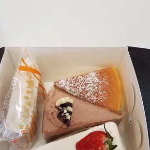 The goodies (lemon bar, slice strawberry shortcake, slice Japanese Cheesecake, slice dream cake)