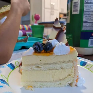 Slice of mango mousse cake.