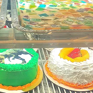 a variety of cakes on display