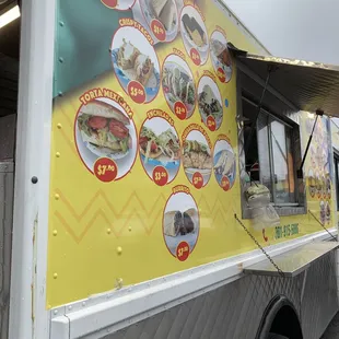 Side of truck with pricing