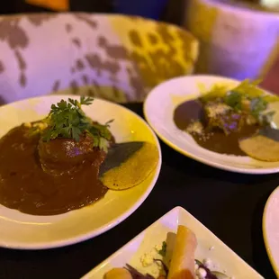 Molé poblano (left) and hazelnut molé